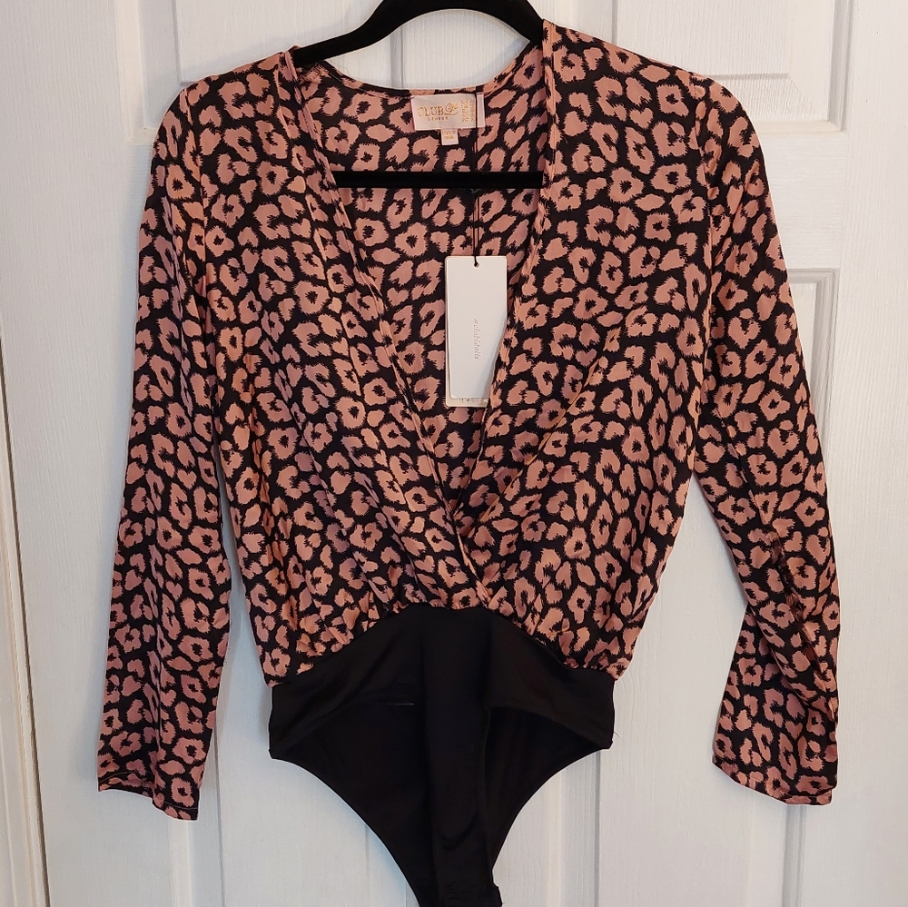 Club L London sz. 6 bodysuit. Pink and black long sleeve ,v neck